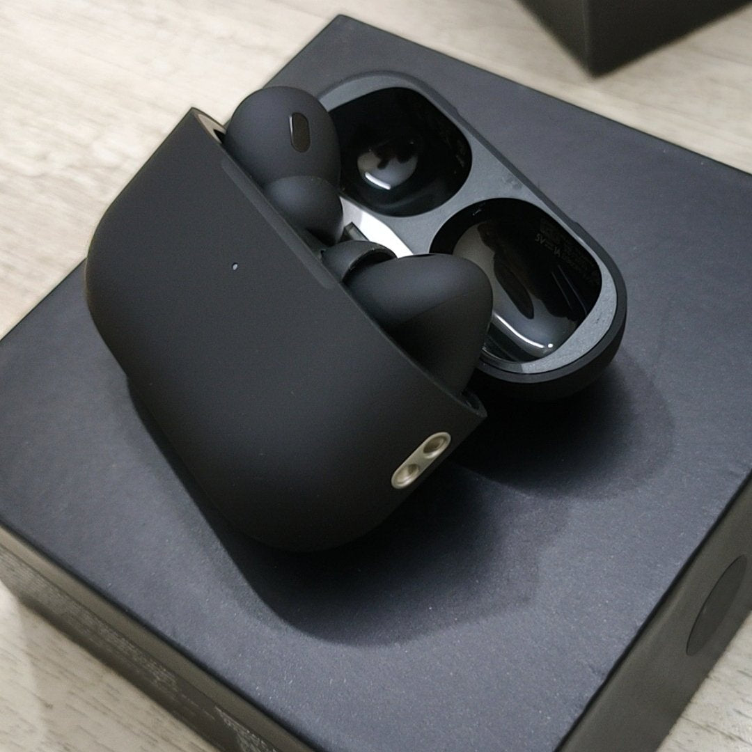 Black Pro 2 earbuds charging case close up