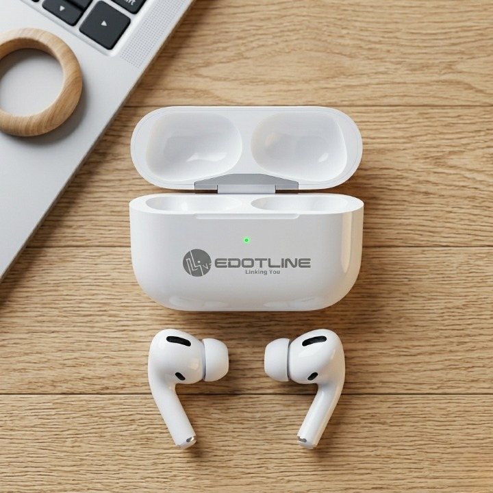 Edotline Pro 2 white earbuds with open case on wooden desk next to laptop