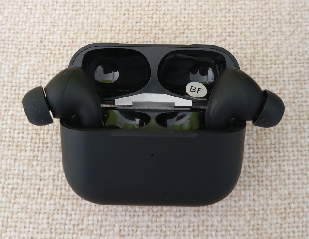 Black Pro 2 earbuds with charging case front view