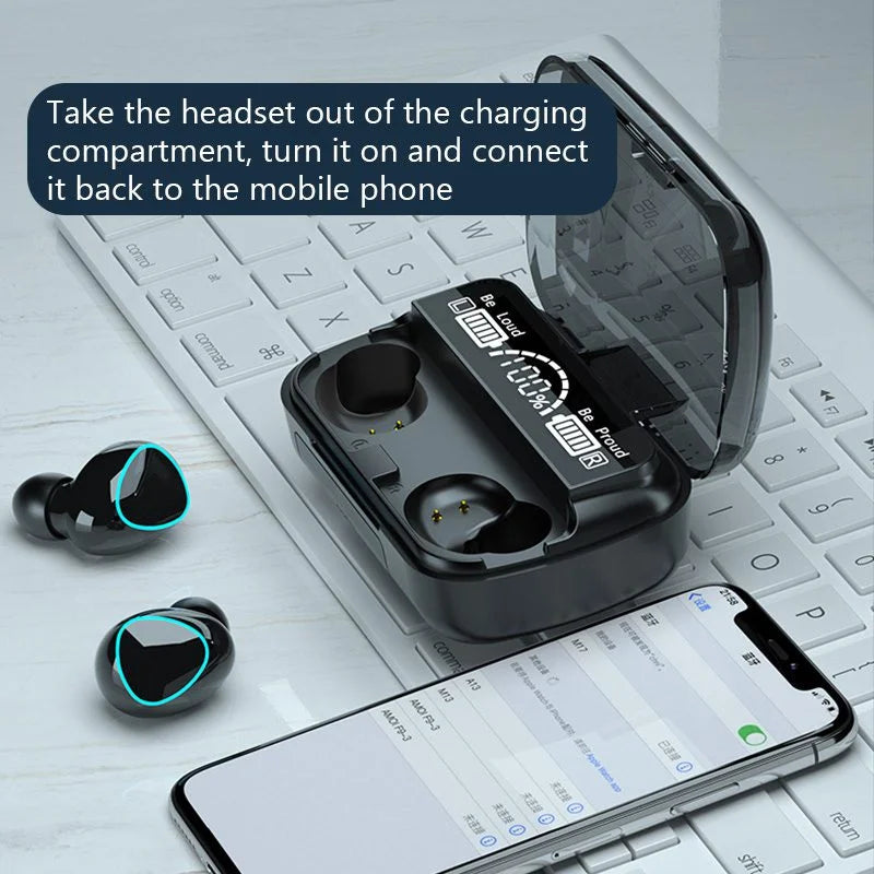 M10 TWS earbuds with charging case on keyboard