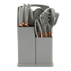 Pink kitchen utensils and knives with matching storage organizer