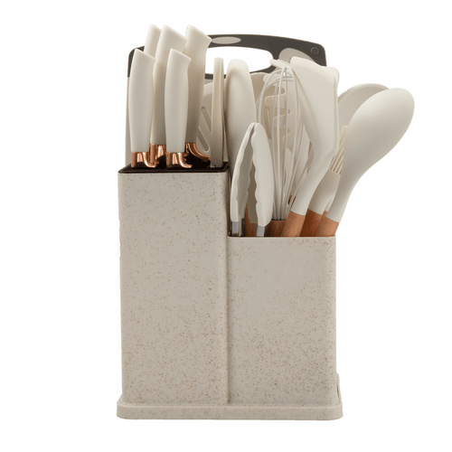 Cream kitchen utensil and knife set arranged in a storage organizer