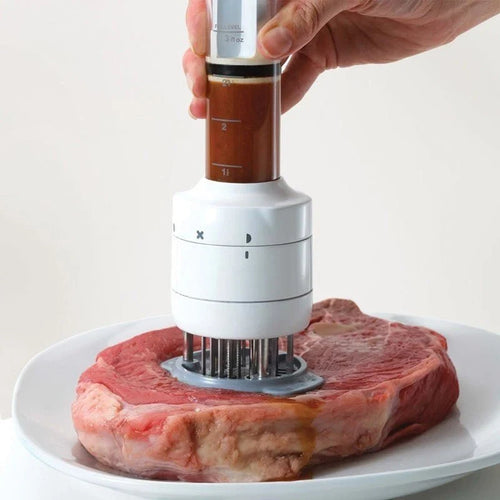 Marinade injector and tenderizer being pressed into a cut of meat